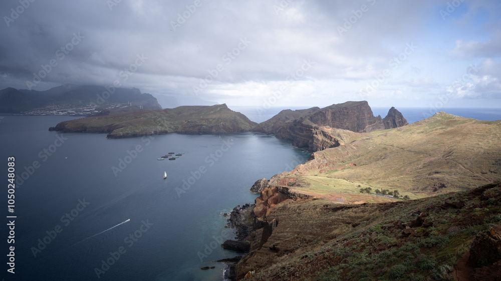 Obraz premium Beautiful landscape with islands, archipelago and cliffs with storm clouds, Madeira, Portugal