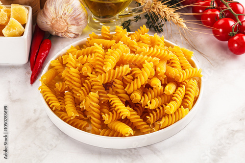 Italian dry pasta Fussili for bowl photo