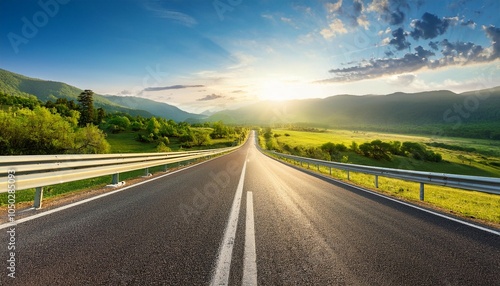 high angle panorama of straight asphalt highway passing through the mountain rural area at sun and clouds spring weather concept of trip transport fast moving forward ideas or road construction