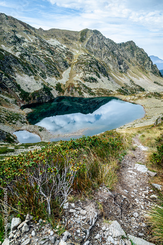 Lake reflections in the mountains photo