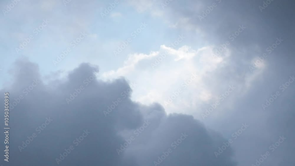 Timelapse of dramatic dark clouds in the sky. Natural patterns and textures. Weather and climate concepts. View of the sky during the day when it will rain. For video transitions. Footage 4K,60 Fps Timelapse of dramatic dark clouds in the sky. Natural patterns and textures. Weather and climate concepts. View of the sky during the day when it will rain. For video transitions. Footage 4K,60 Fps