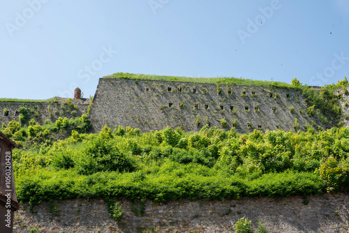 The fortress in the heart of Klodzko, Poland, stands majestically, showcasing its historical significance and offering a stunning view of the surrounding area. photo