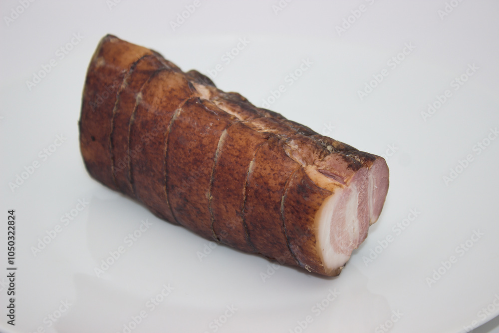 Rustic smoked pork loin with tender, juicy slices Rustic smoked pork loin with tender, juicy slices