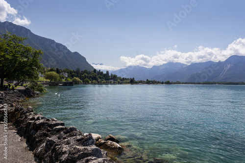 Scenic summer view of Lake Geneva (Lac Leman) near Montreux, in Vaud, Switzerland. With clear sky anf beautiful turquoise water. Copy space above. photo