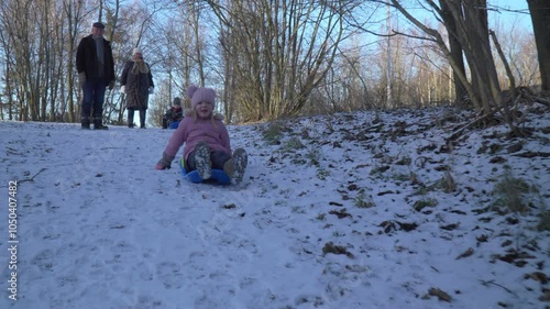 Kids bobsledding