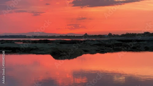 Wallpaper Mural Sunset sky with clouds. Bright orange sun over the Mediterranean Sea. Evening scarlet sky. Seascape at sunset. A picturesque horizon above the water. A breathtaking sunset over the sea. 4К Torontodigital.ca
