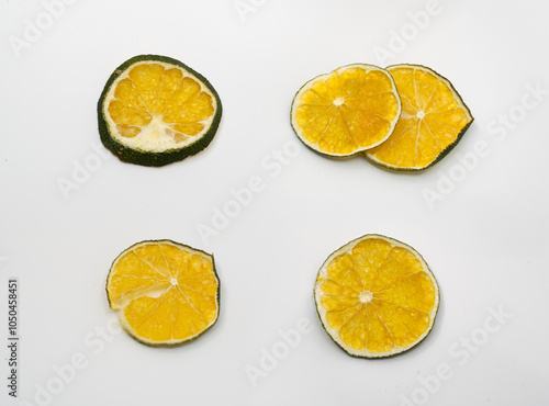 Dried Lime Slices on White Background