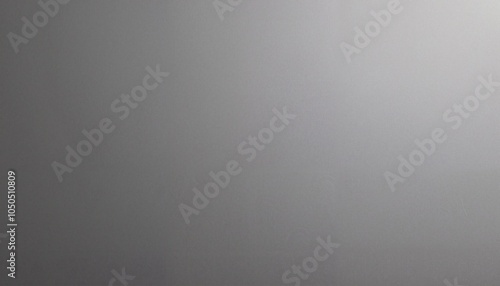 Matte grey surface with soft gradient and copy space for design
