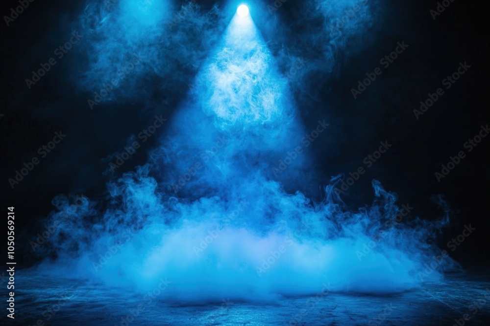 Fototapeta premium A dramatic blue spotlight illuminating an empty stage, casting vibrant shadows on the floor, creating a captivating atmosphere for performances