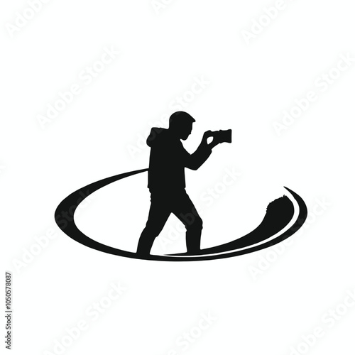 A black silhouette of a young man with short dark hair wearing a camera and taking a photo,