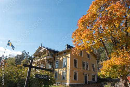 Photography Nacka Gård historic yellow wooden villa and estate outside Stockholm, Sweden wit