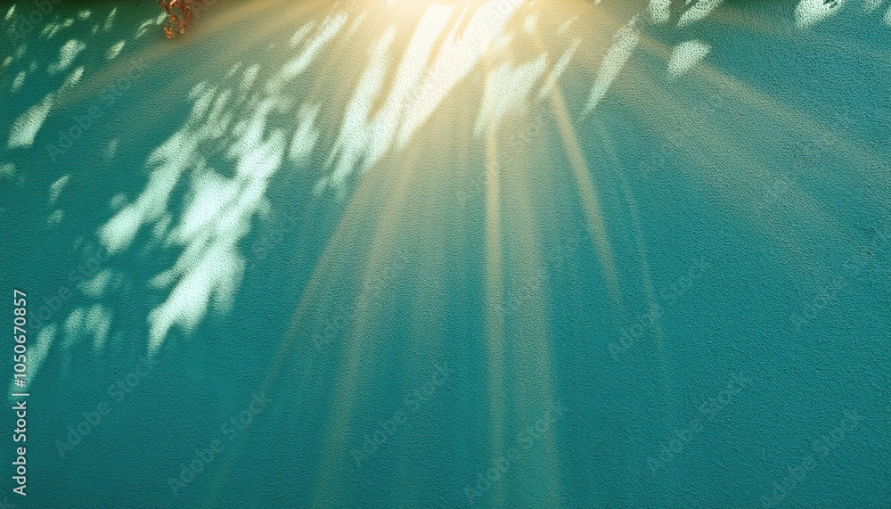 Fototapeta premium Radiant Golden Sunlight Beams Spreading Across a Textured Turquoise Wall Background. Perfect for Inspirational Design, Wellness Branding, Spiritual Imagery, or Calming Visual Content