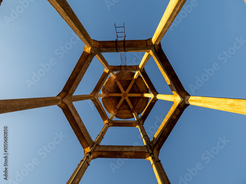 rainwater tank old container seen from below photo