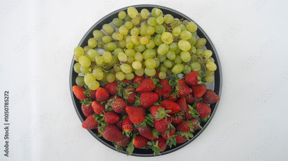 Various tropical fruits such as mango, banana, orange, grape and strawberry Various tropical fruits such as mango, banana, orange, grape and strawberry