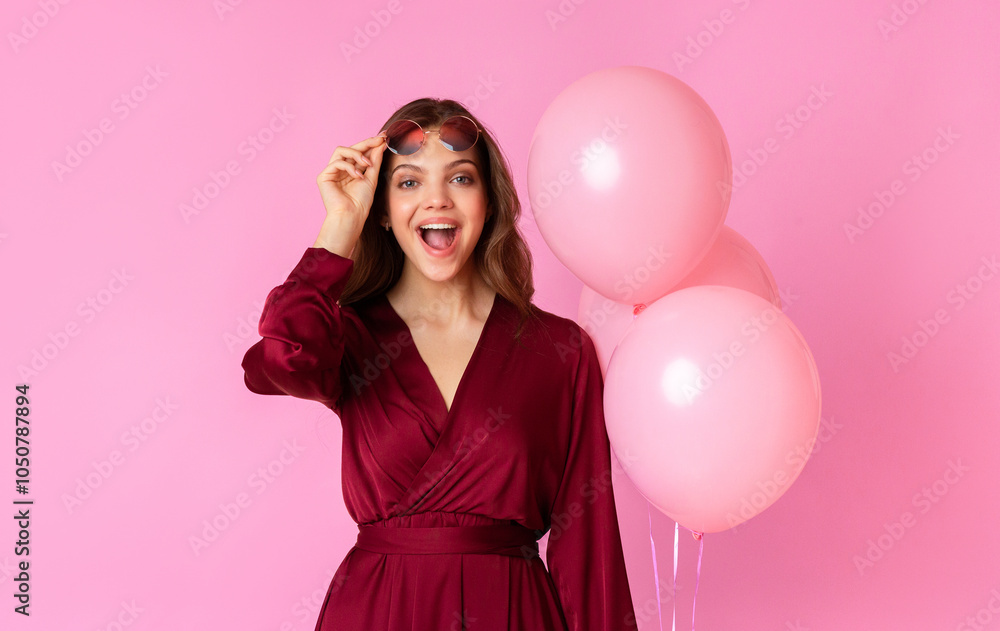Wow. Surprised Lady Taking Off Glasses And Opening Mouth In Amazement, Holding Balloons While Posing Over Colorful Background, Free Space Wow. Surprised Lady Taking Off Glasses And Opening Mouth In Amazement, Holding Balloons While Posing Over Colorful Background, Free Space