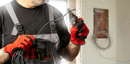 Man electrician. Foreman cu...