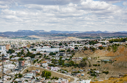 Panoramic view of Comodoro Rivadavia city with buildings on the mountains. Chubut province, Patagonia Argentina. photo