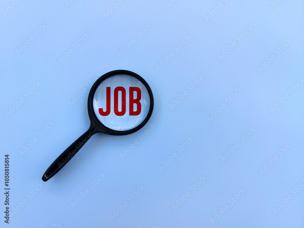 Magnifying glass over a word job, concept of seeking for job on blue background Magnifying glass over a word job, concept of seeking for job on blue background