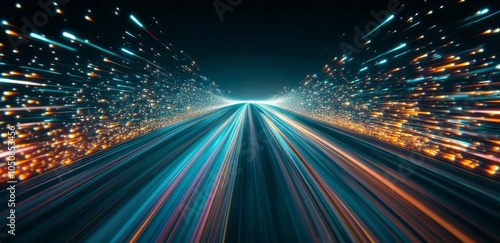 Vibrant light trails create a sense of motion in a nighttime urban landscape ...
