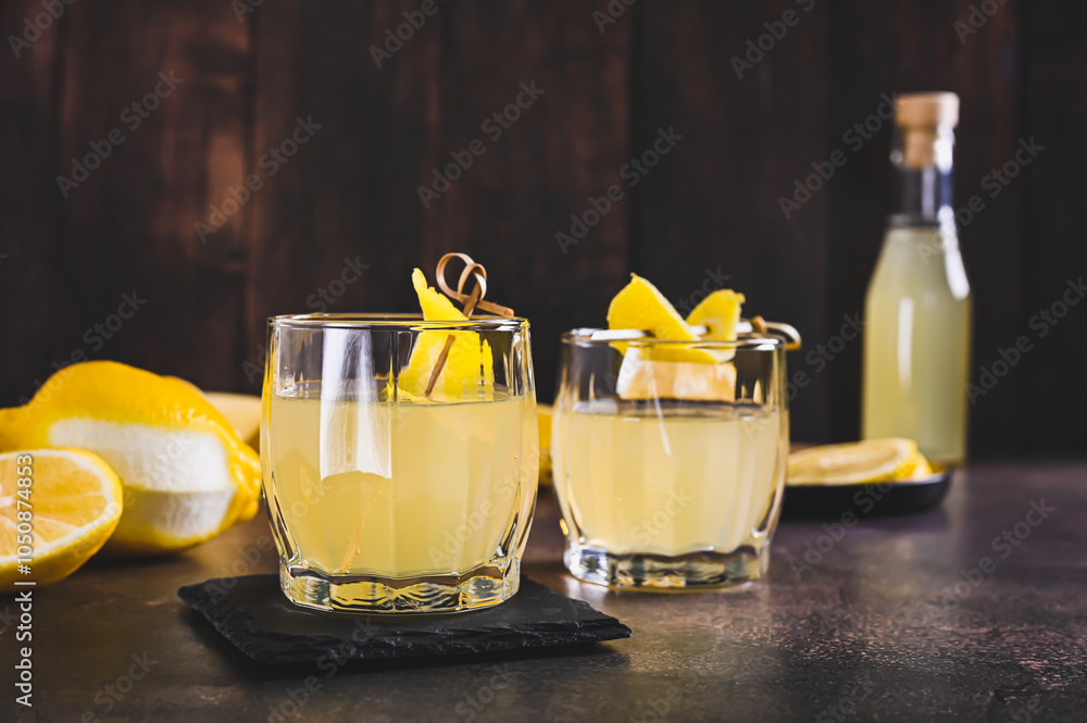 Traditional homemade limoncello in glasses on the table