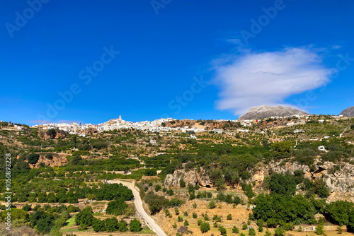 Panoramic view on picturesque typical Spanish village with cozy white houses in Yunquera, Andalusia, Spain photo