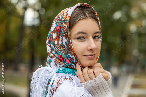 Russian beauty - young beautiful woman in a traditional headscarf