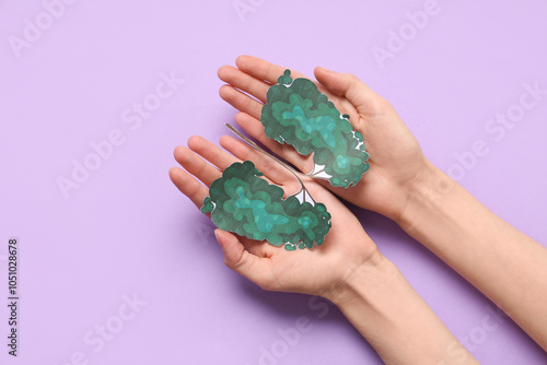 Female hands with drawn pap...