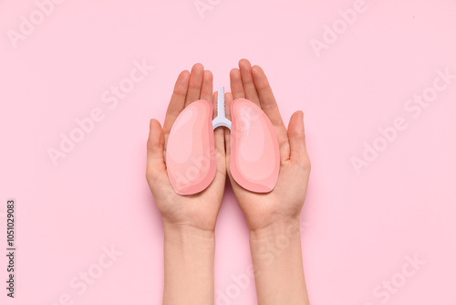 Female hands with paper lun...