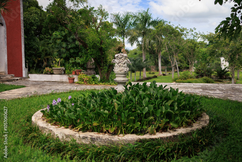 Fountain in garden. Hacienda Hunxectaman, Yucatan