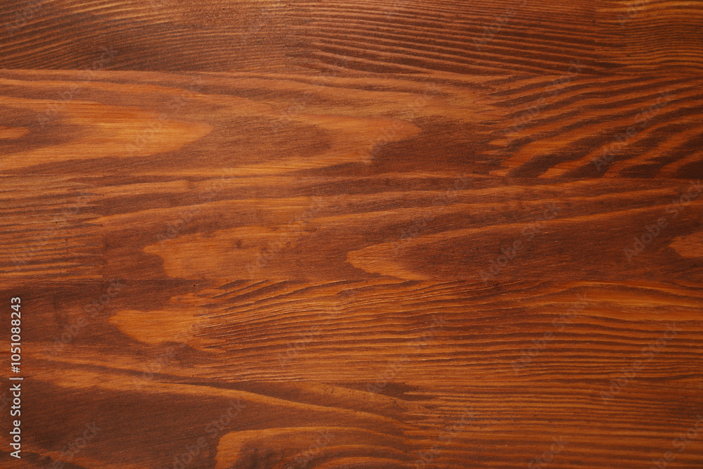 Obraz premium Applying walnut wood stain. Texture of wooden surface as background, top view