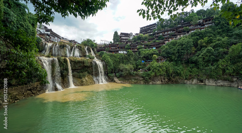 The Wangcun Waterfall at Furong Ancient Town. Landscape scene of Furong Zhen, China photo