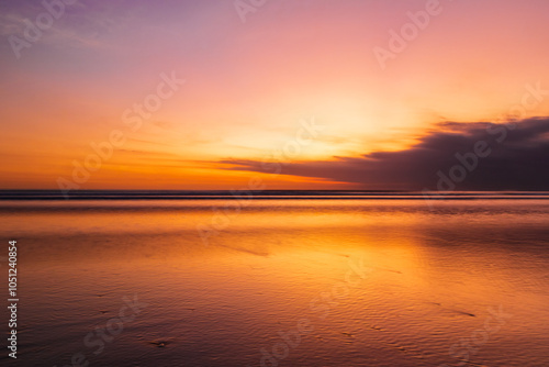 Fototapeta Naklejka Na Ścianę i Meble -  Scenery of sunset beach at Kuta Beach, Bali, Indonesia.
