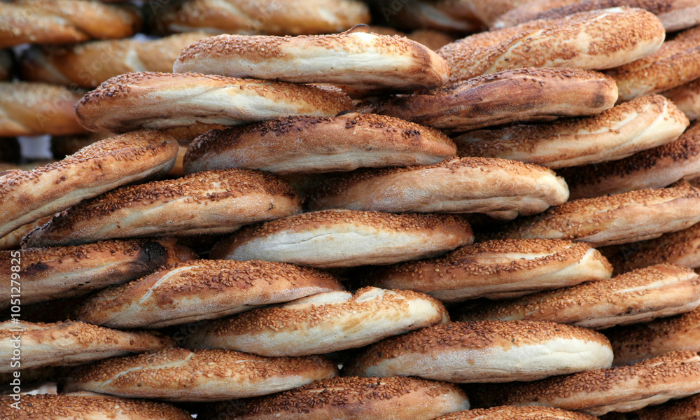 Close up of The Turkish Sesame Bagel aka Simit for sale at Farmers market in Adana, Turkey Close up of The Turkish Sesame Bagel aka Simit for sale at Farmers market in Adana, Turkey