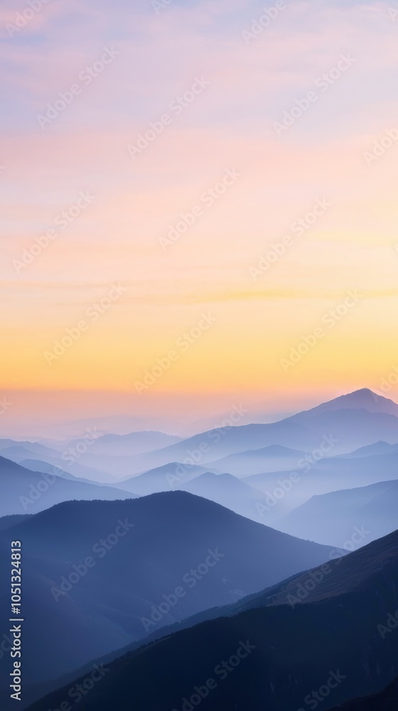 Breathtaking mountain range at sunset, showcasing layers of mist and vibrant colors in the sky. Breathtaking mountain range at sunset, showcasing layers of mist and vibrant colors in the sky.