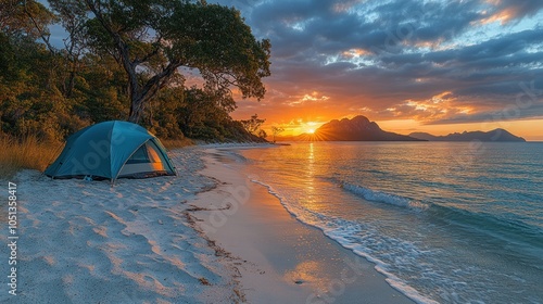 Sunset Over a Mountain Range with a Tent on a Beach