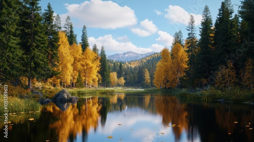 Serene lake reflecting autumn trees and mountains under a blue sky with fluffy clouds.