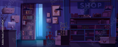 Dark night antique shop interior with bookshelves filled with books, old decorative items and counter desk with cash register, adorned with framed art on walls and large window. Empty closed store.