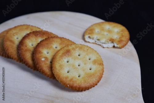 Close up of stack of round saltine crackers photo