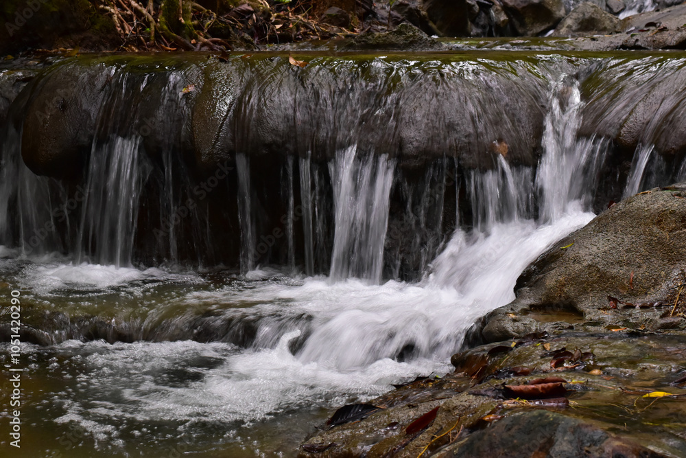 Obraz premium Visit the waterfall for additional refreshment
