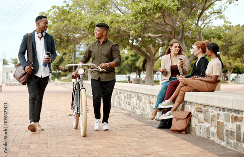 Friends, urban park and walking with morning commute and bike together with talk in city. Eco friendly, people and town with group, outdoor and conversation on pavement with travel and communication