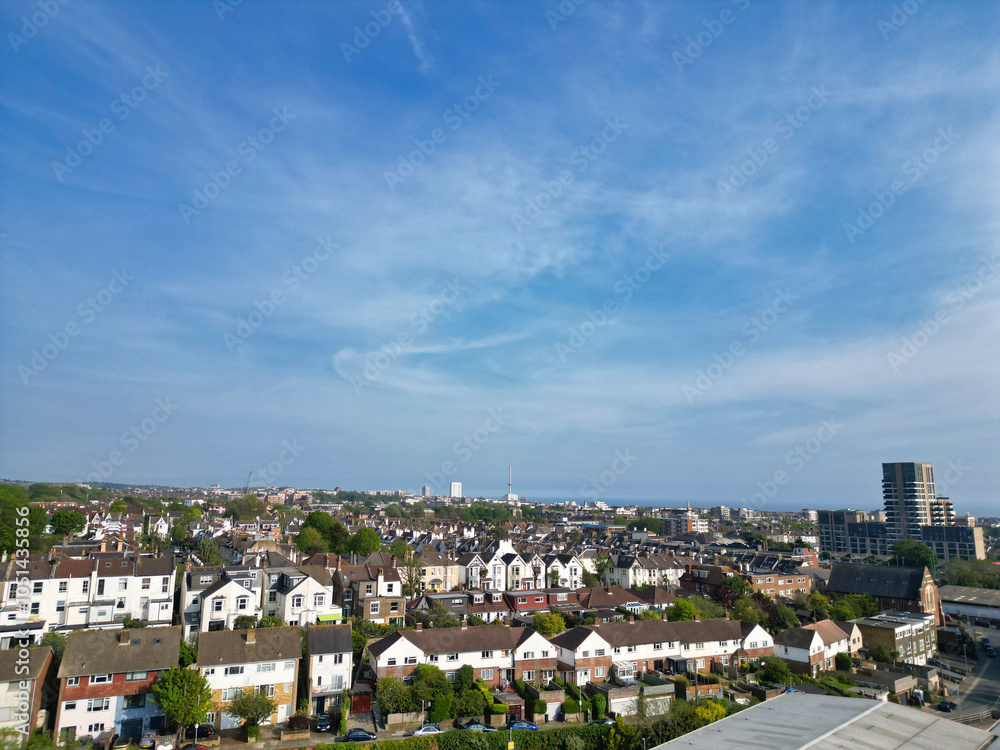 Fototapeta premium High Angle View of Most Beautiful and Attractive British Tourist Attraction of Brighton seaside resort and Beach City of East Sussex, England GB. Footage Captured with Drone's Camera on May 9th, 2024