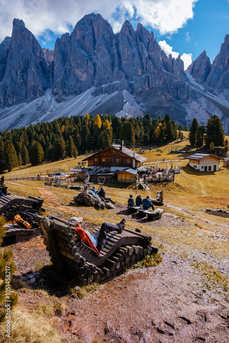 Tranquil afternoon in the Dolomites with stunning peaks and rustic charm photo