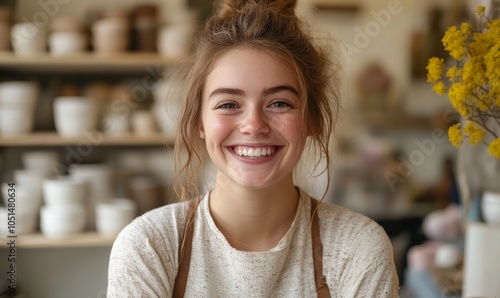 Wallpaper Mural Cheerful young ceramist laughing happily in her shop, Generative AI Torontodigital.ca