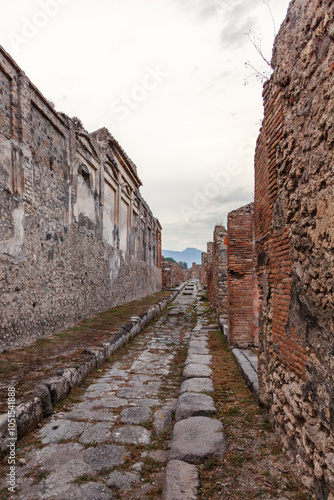 Wallpaper Mural Street in Pompeii receding into perspective. Evening lighting. Torontodigital.ca