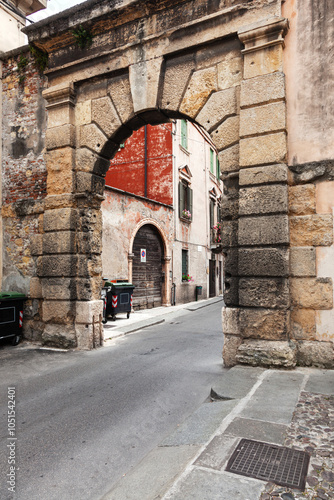 Wallpaper Mural A narrow Italian street passes through a rusticated arch. Torontodigital.ca