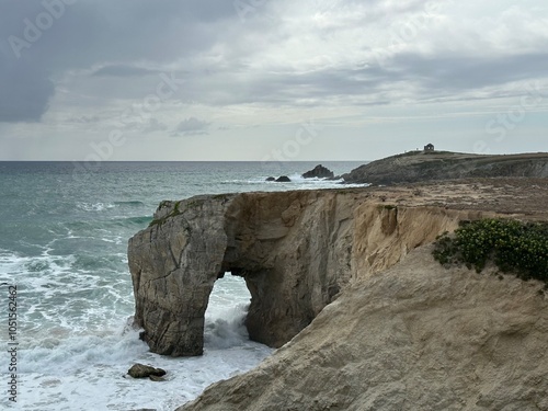 Obraz na płótnie Arche de Port Blanc arch rock formation in the Atlantic Ocean on Quiberon peninsula, Portivy, Lorient, Brittany, France, July 2023 w salonie