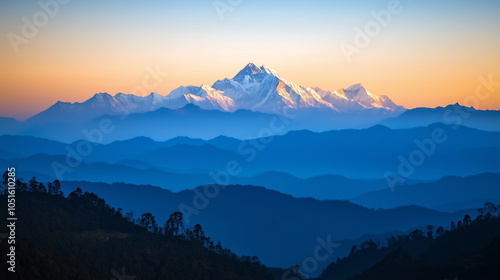 Wallpaper Mural A view of the Himalayas under the red-colored morning sky. A natural landscape with snow-covered peaks, layered ridges, and blue coniferous forests. Torontodigital.ca