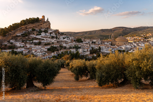 Panoramic view of Montefrio since National Geographic lookout with olive trees in the foreground at sunset. Granada, Andalucia, Spain. photo