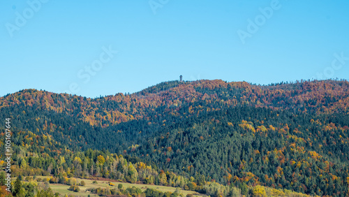 Gorce mountain range. Mountains in autumn. Wooden observation tower on Mount Lubań. Poland photo