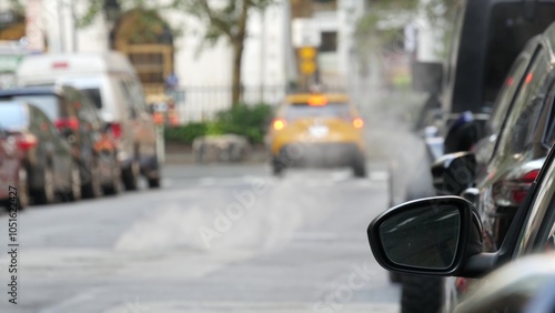 Wallpaper Mural Hot smoke from manhole, Con Edisons Steam system in New York City, United States. Vapor from road. Beaver Street, NYC Downtown Financial District, Manhattan, USA. Urban scene. Yellow taxi, Broadway. Torontodigital.ca